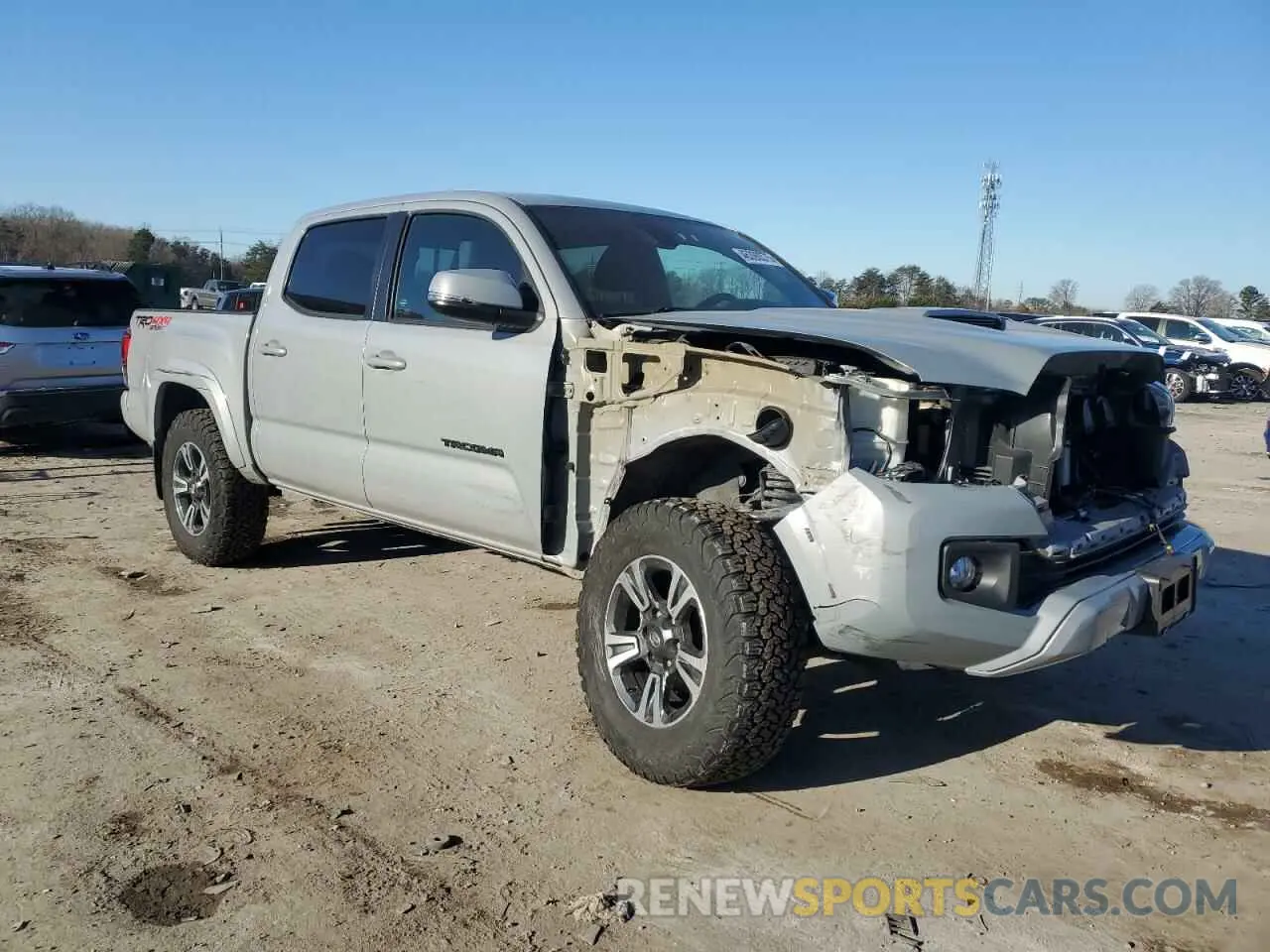 4 Photograph of a damaged car 5TFCZ5AN5KX174229 TOYOTA TACOMA 2019