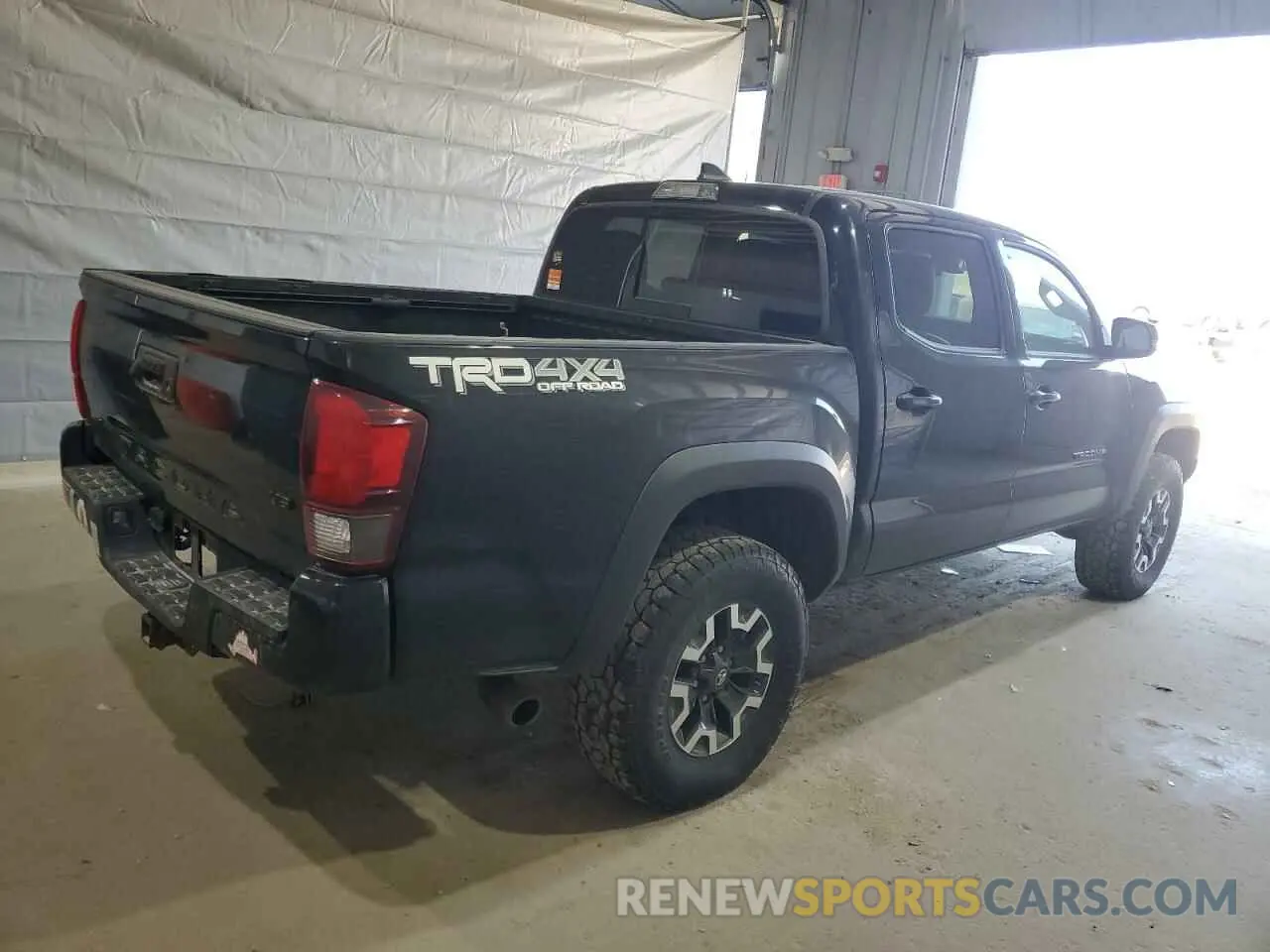 3 Photograph of a damaged car 5TFCZ5AN5KX185683 TOYOTA TACOMA 2019