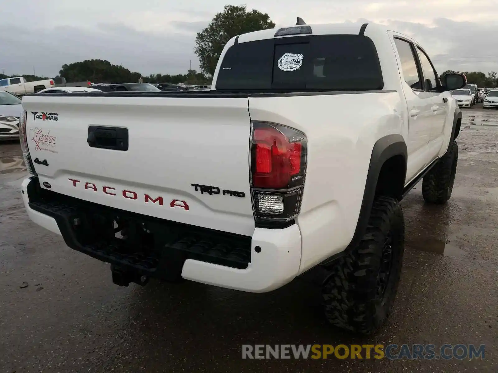 4 Photograph of a damaged car 5TFCZ5AN5KX188647 TOYOTA TACOMA 2019