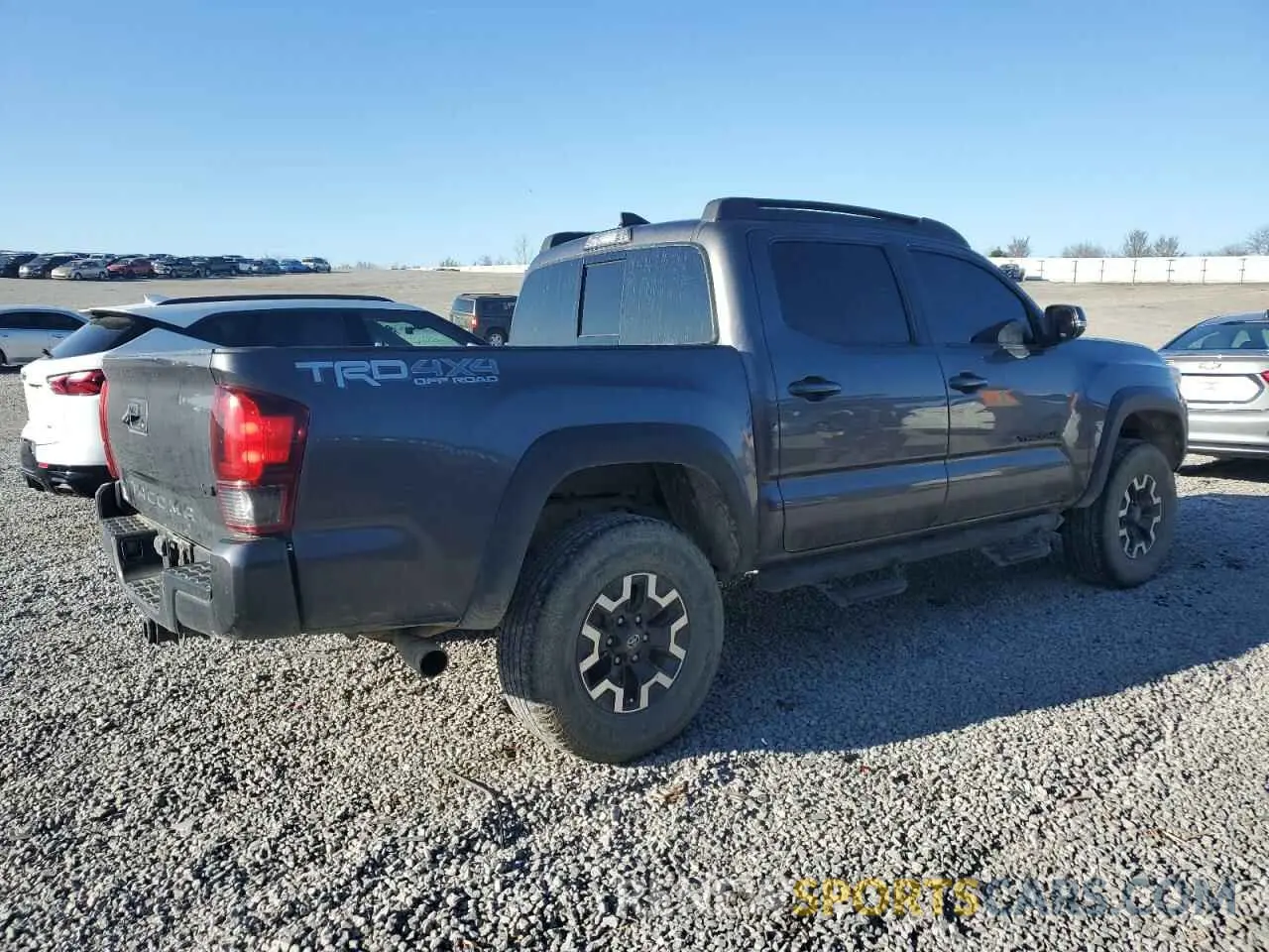 3 Photograph of a damaged car 5TFCZ5AN5KX191046 TOYOTA TACOMA 2019