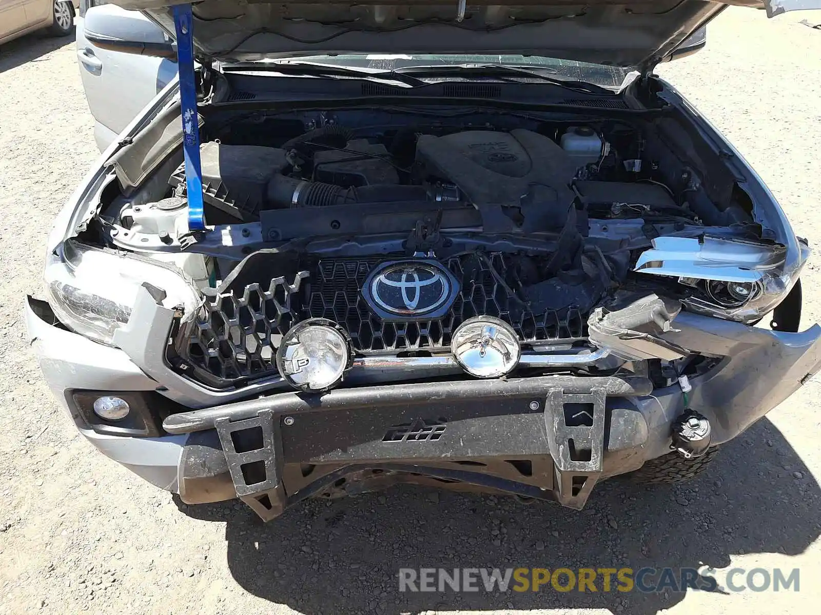 7 Photograph of a damaged car 5TFCZ5AN6KX168231 TOYOTA TACOMA 2019