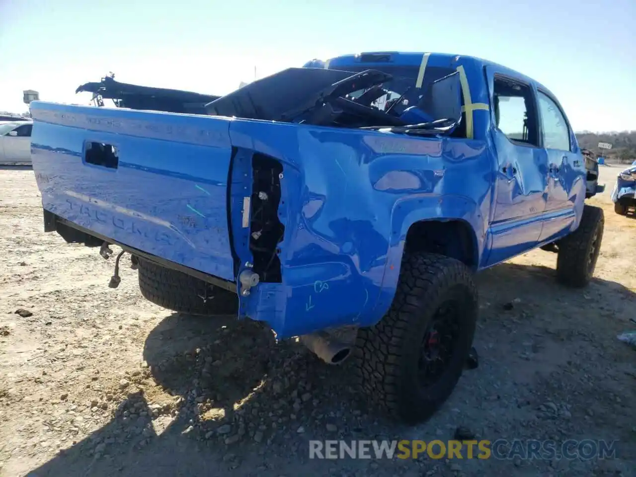 4 Photograph of a damaged car 5TFCZ5AN6KX173526 TOYOTA TACOMA 2019