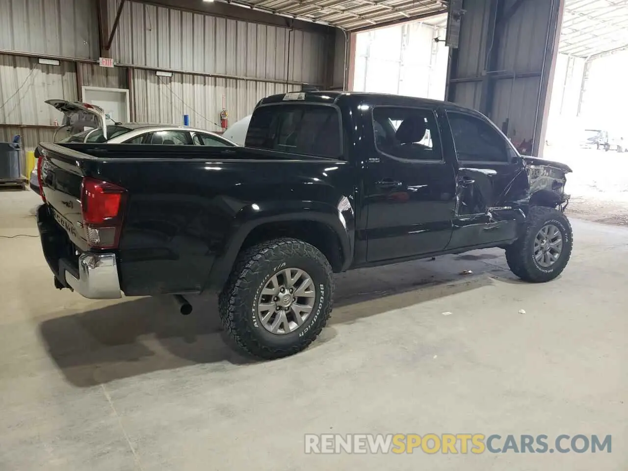 3 Photograph of a damaged car 5TFCZ5AN6KX179133 TOYOTA TACOMA 2019