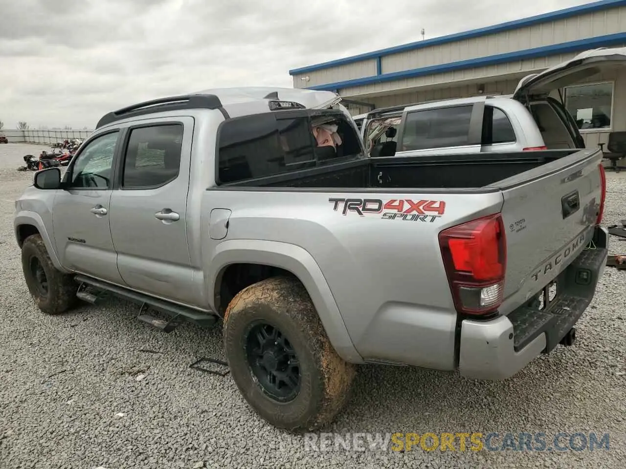 2 Photograph of a damaged car 5TFCZ5AN6KX194571 TOYOTA TACOMA 2019