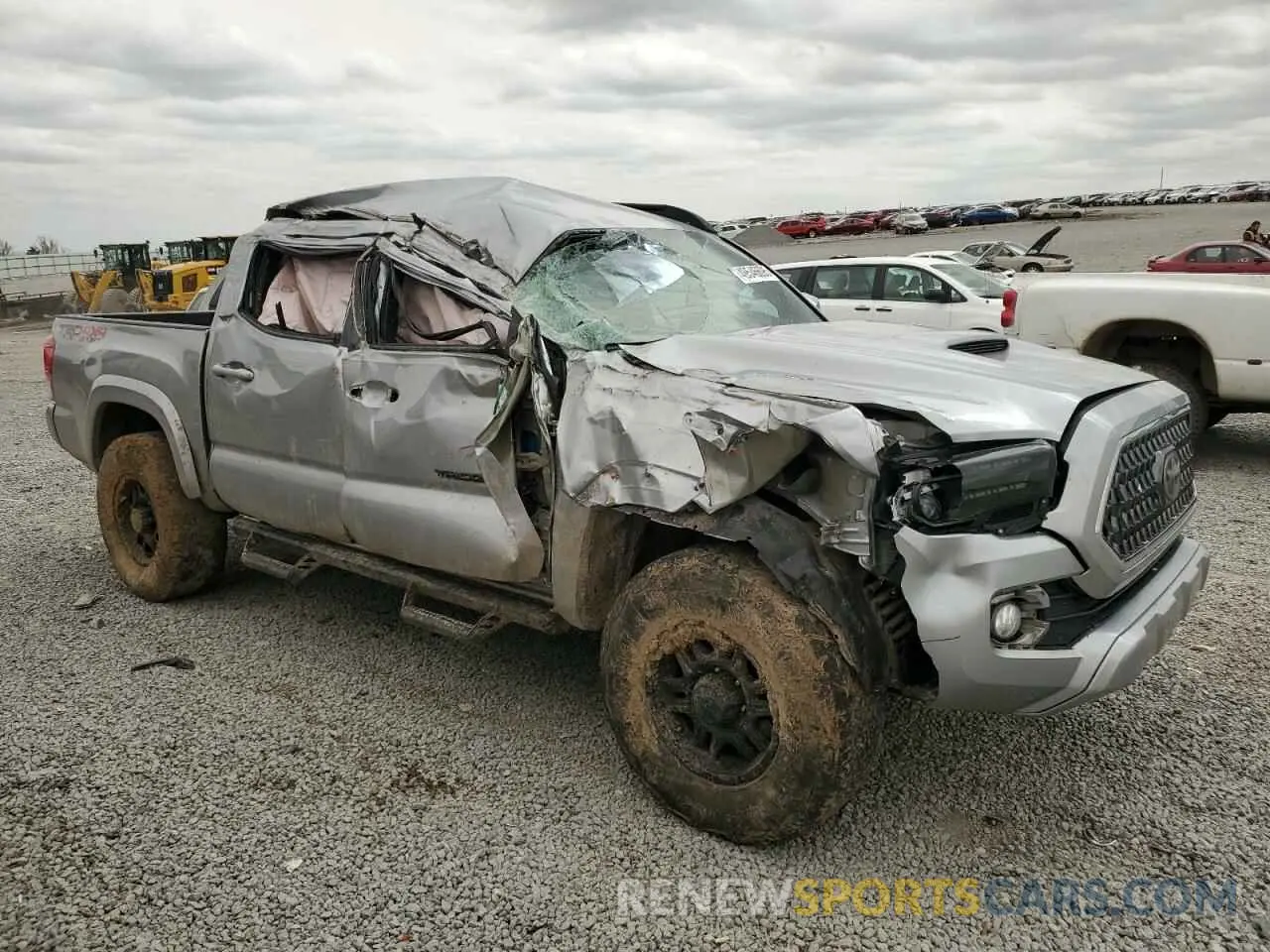 4 Photograph of a damaged car 5TFCZ5AN6KX194571 TOYOTA TACOMA 2019