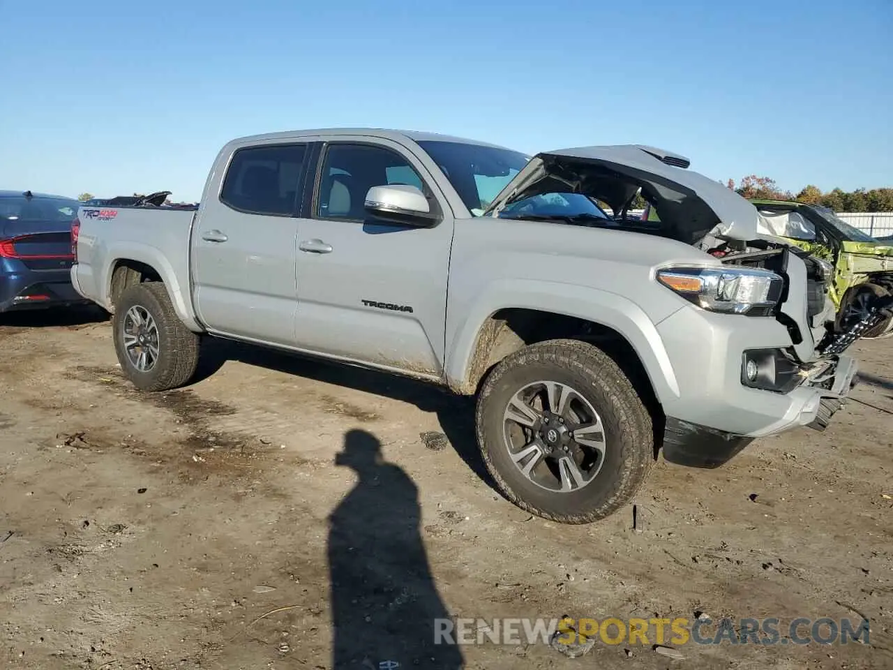 4 Photograph of a damaged car 5TFCZ5AN7KX173194 TOYOTA TACOMA 2019