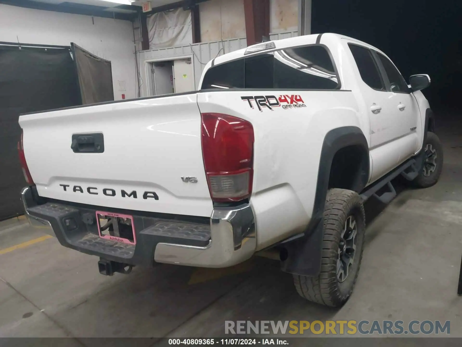 4 Photograph of a damaged car 5TFCZ5AN7KX179593 TOYOTA TACOMA 2019