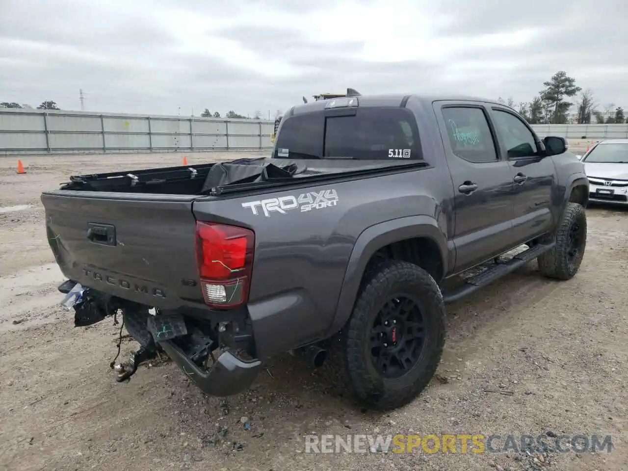 4 Photograph of a damaged car 5TFCZ5AN7KX206565 TOYOTA TACOMA 2019