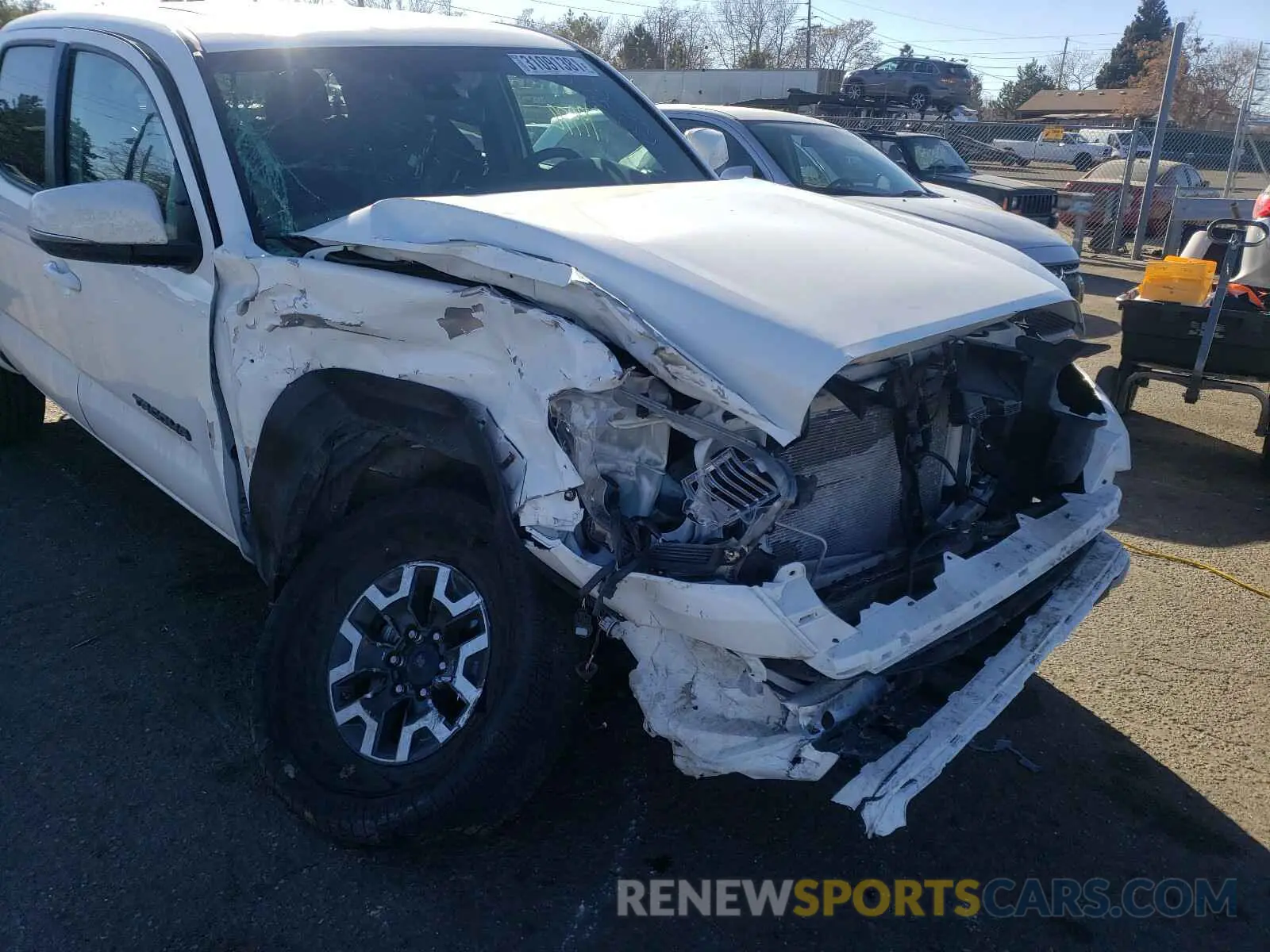 9 Photograph of a damaged car 5TFCZ5AN7KX207621 TOYOTA TACOMA 2019