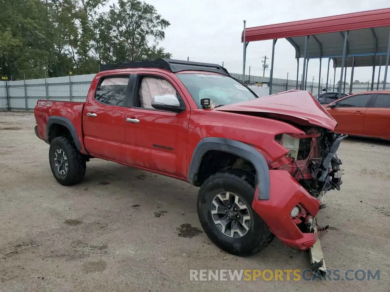 4 Photograph of a damaged car 5TFCZ5AN8GX006723 TOYOTA TACOMA 2019