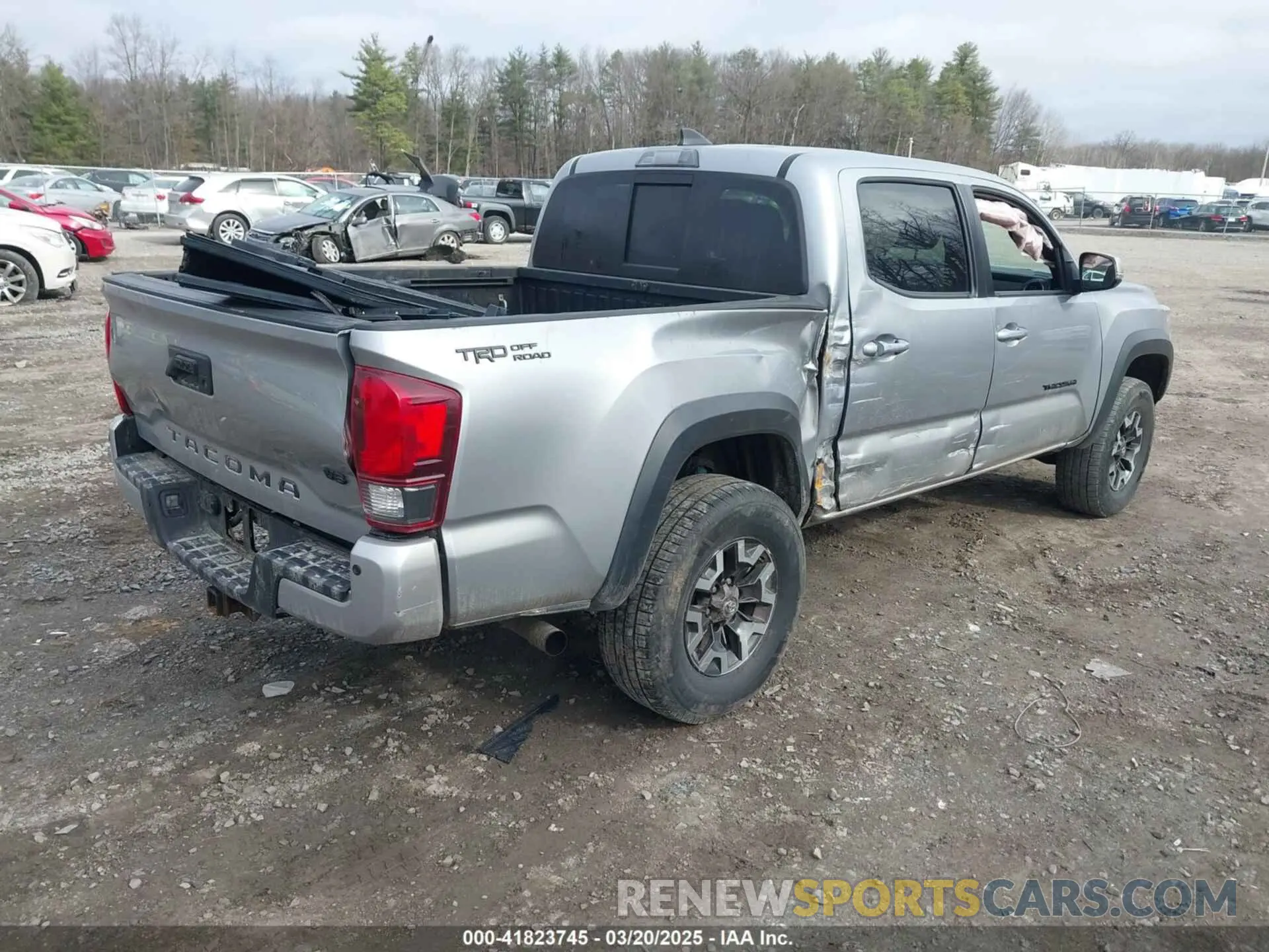 4 Photograph of a damaged car 5TFCZ5AN8KX168893 TOYOTA TACOMA 2019