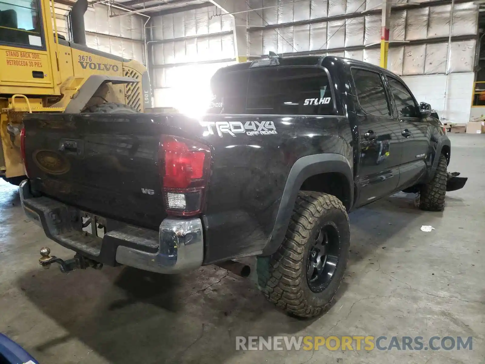 4 Photograph of a damaged car 5TFCZ5AN8KX172927 TOYOTA TACOMA 2019