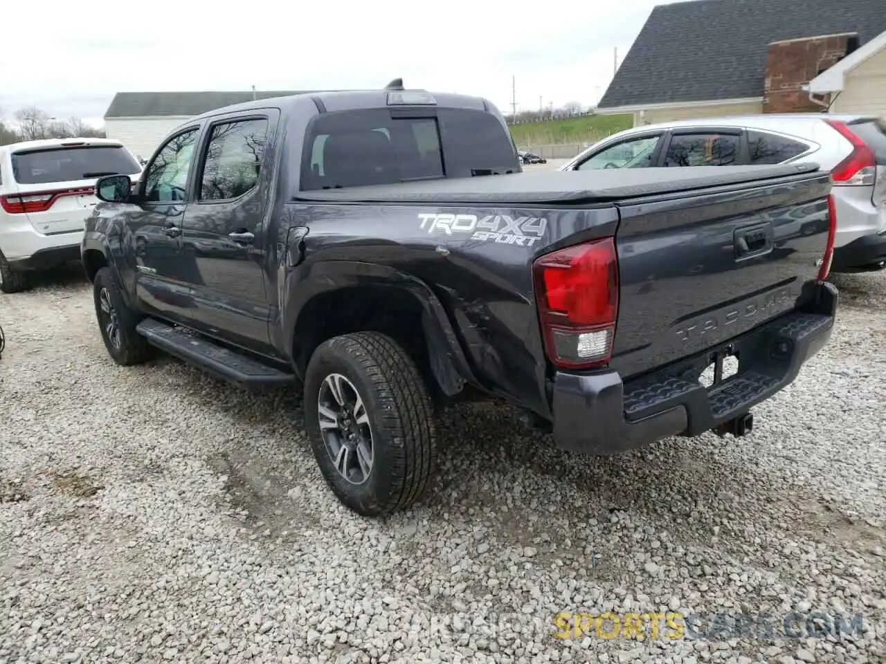 3 Photograph of a damaged car 5TFCZ5AN8KX185404 TOYOTA TACOMA 2019