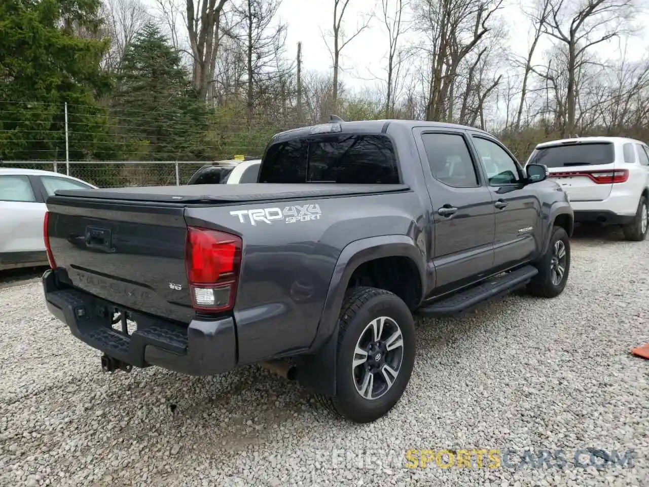 4 Photograph of a damaged car 5TFCZ5AN8KX185404 TOYOTA TACOMA 2019