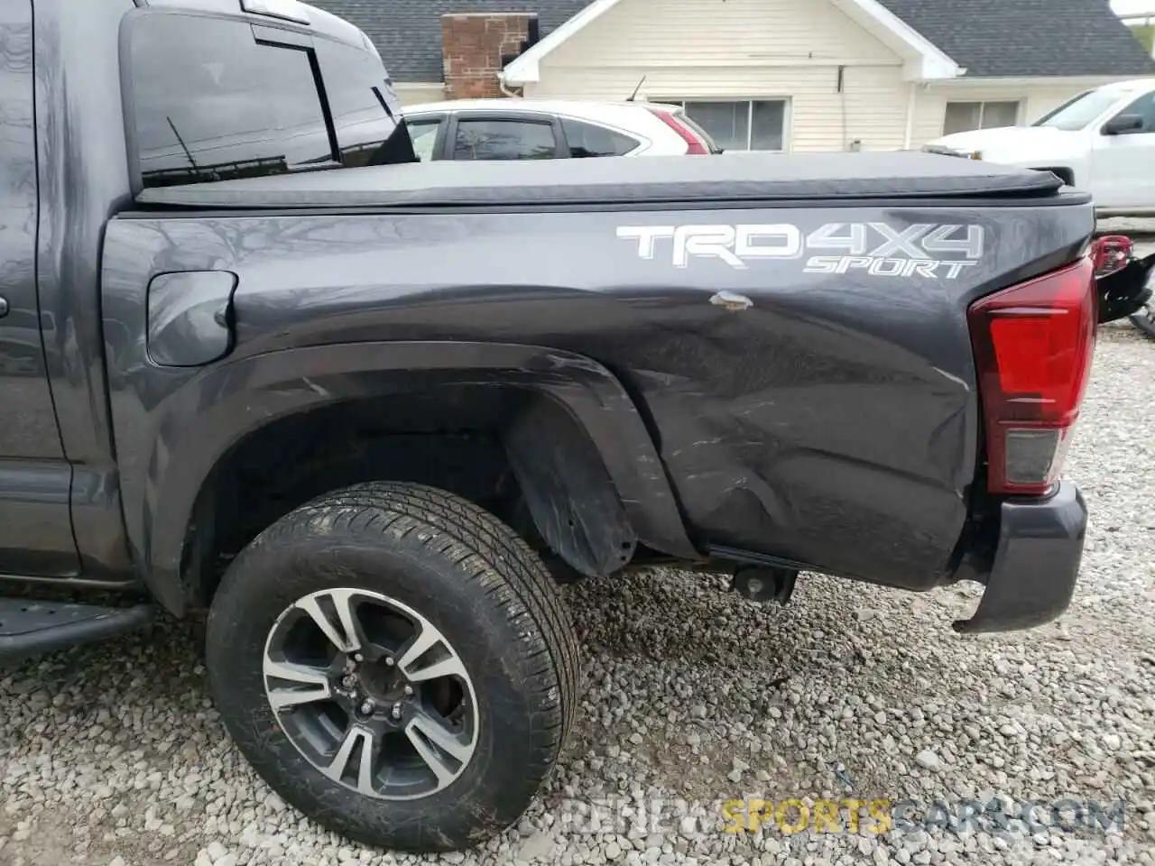 9 Photograph of a damaged car 5TFCZ5AN8KX185404 TOYOTA TACOMA 2019