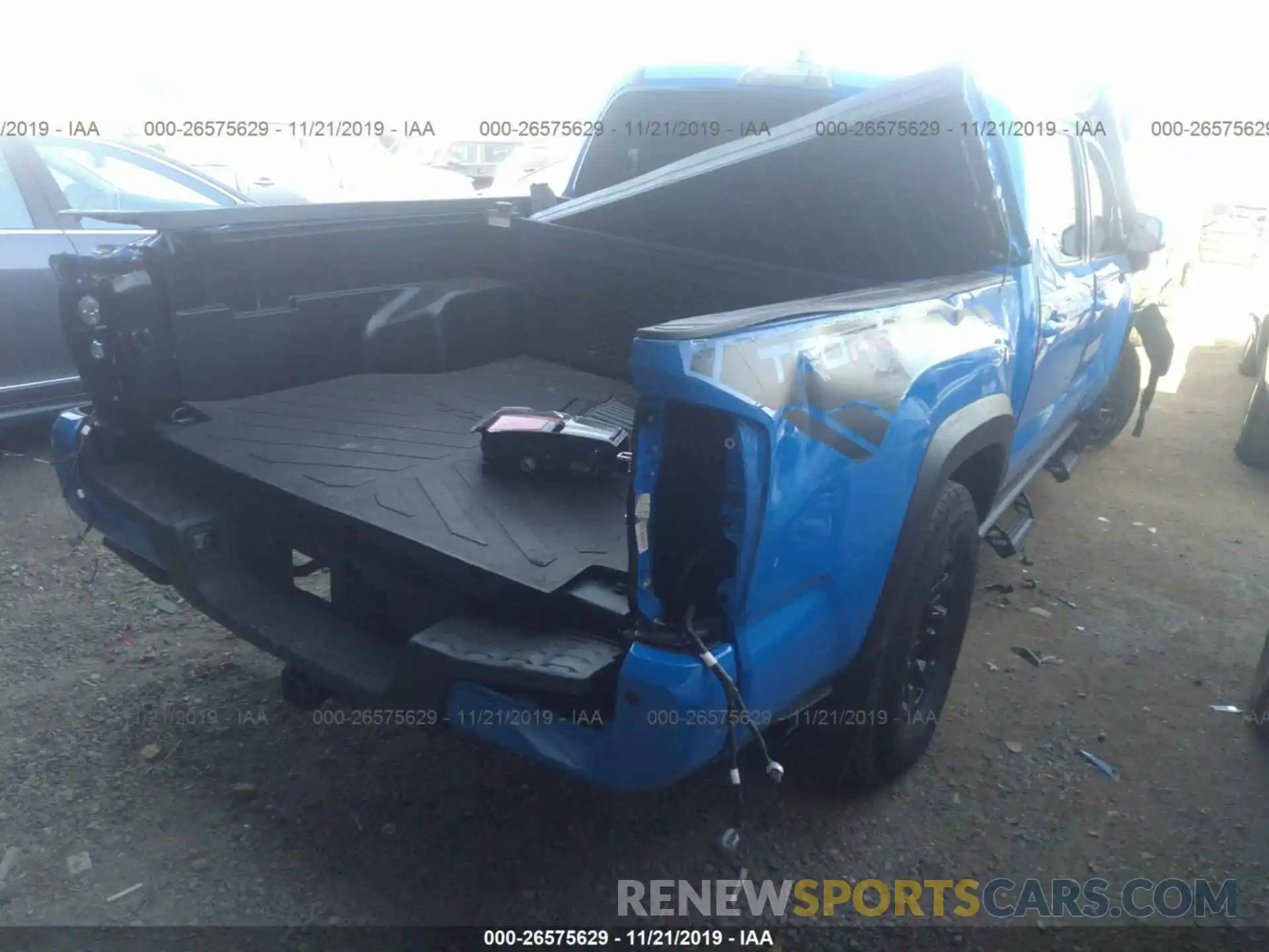 4 Photograph of a damaged car 5TFCZ5AN8KX186374 TOYOTA TACOMA 2019