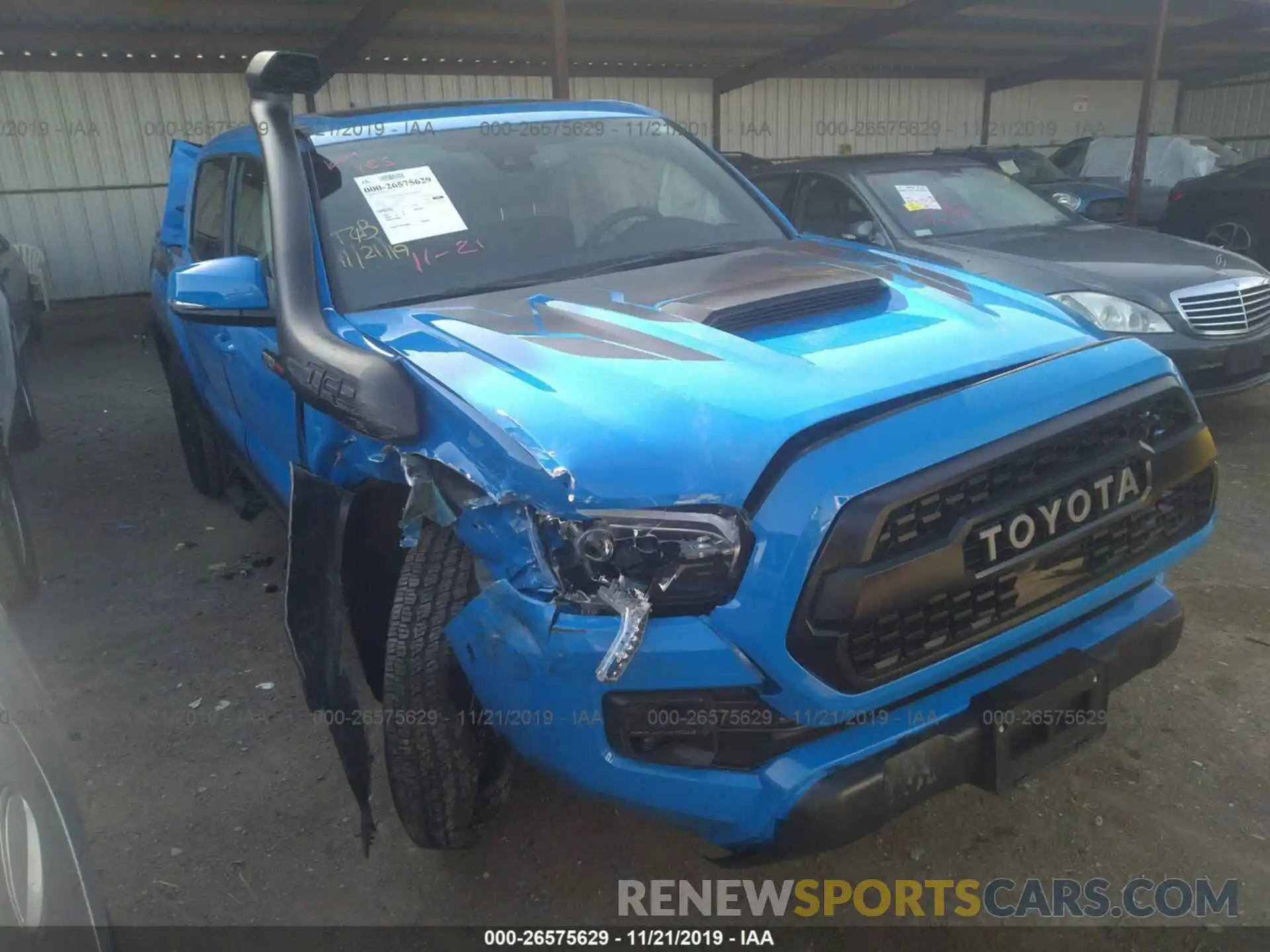 6 Photograph of a damaged car 5TFCZ5AN8KX186374 TOYOTA TACOMA 2019