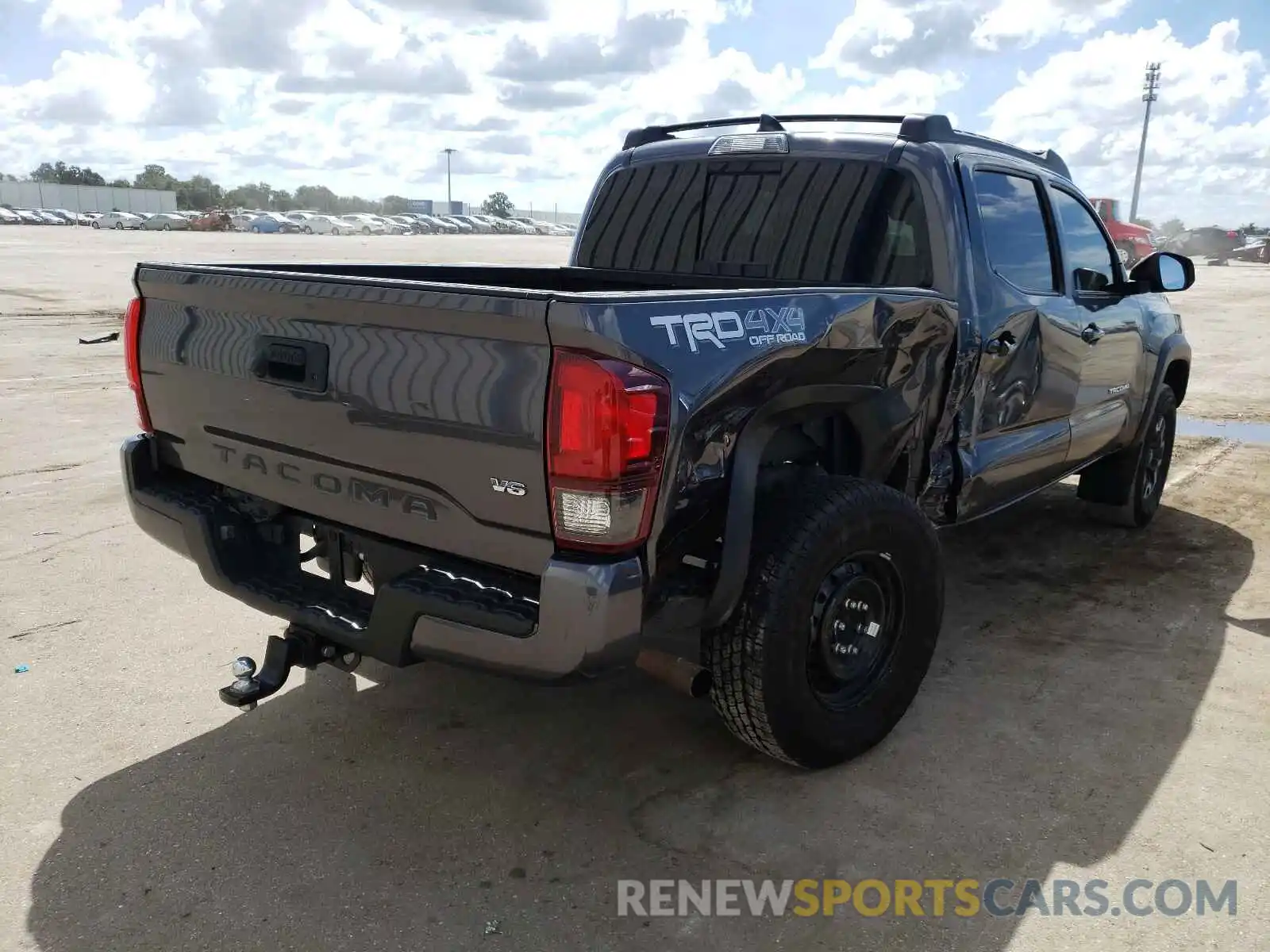 4 Photograph of a damaged car 5TFCZ5AN8KX188366 TOYOTA TACOMA 2019