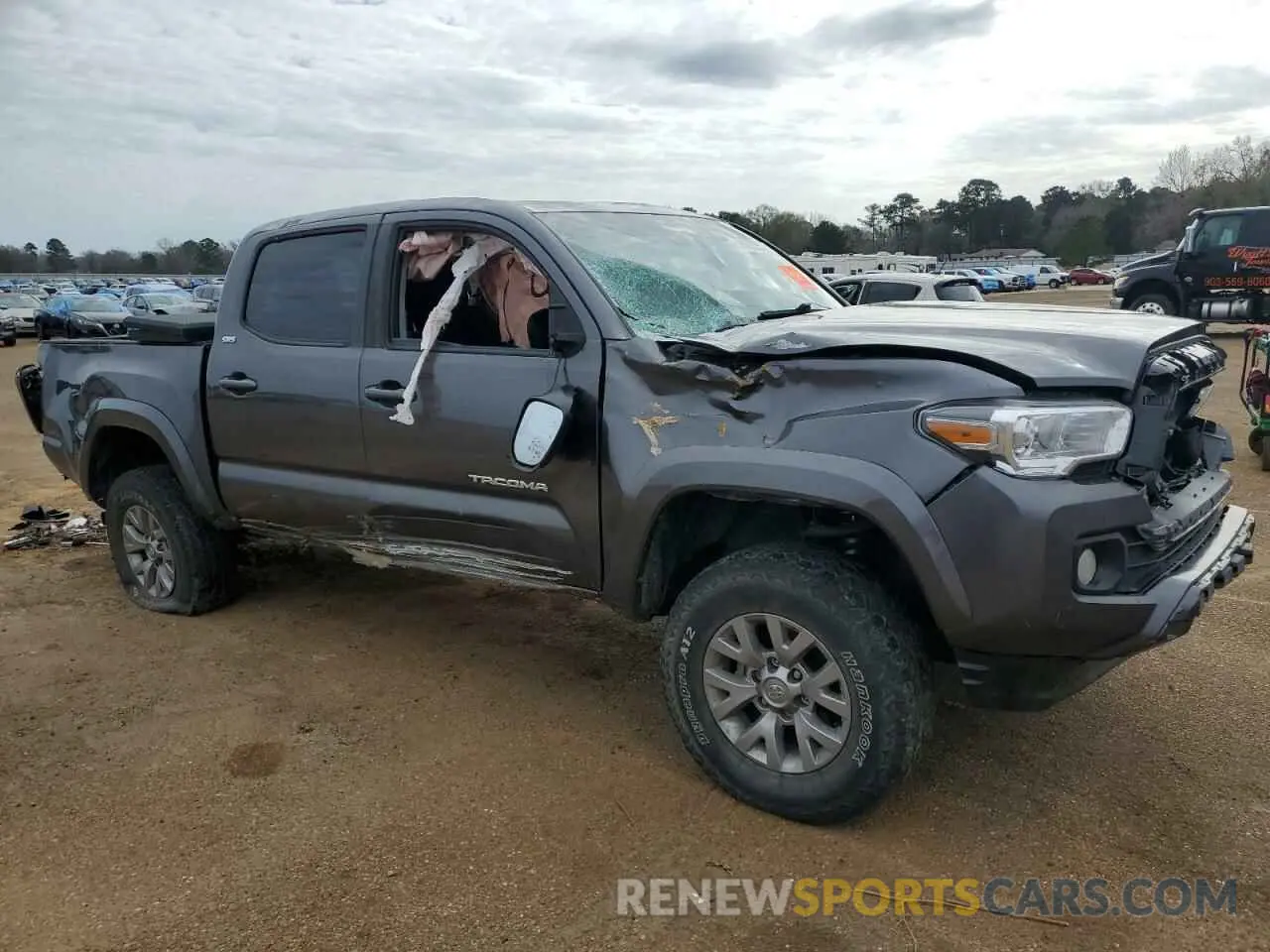 4 Photograph of a damaged car 5TFCZ5AN8KX192708 TOYOTA TACOMA 2019