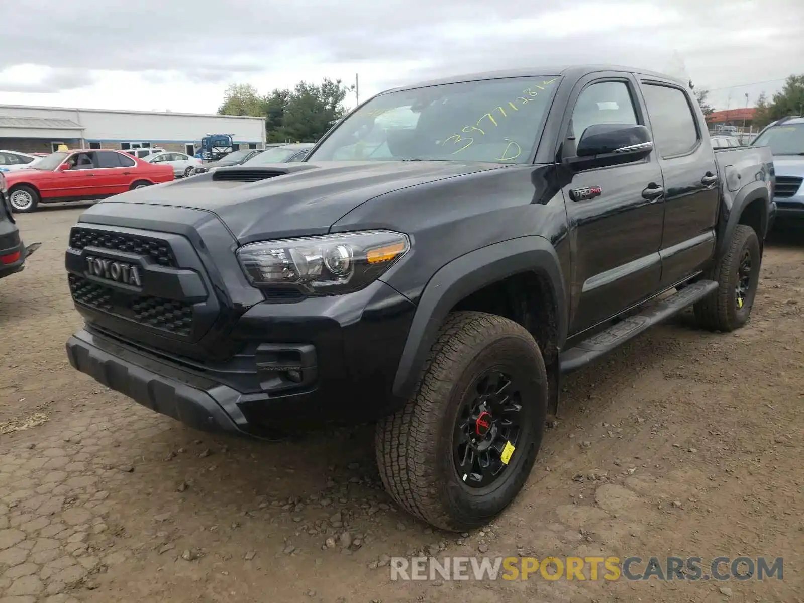 2 Photograph of a damaged car 5TFCZ5AN8KX212004 TOYOTA TACOMA 2019