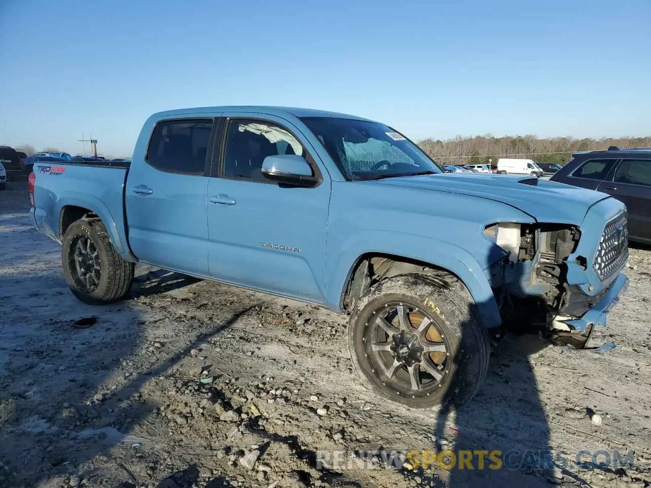 4 Photograph of a damaged car 5TFCZ5AN9KX197223 TOYOTA TACOMA 2019