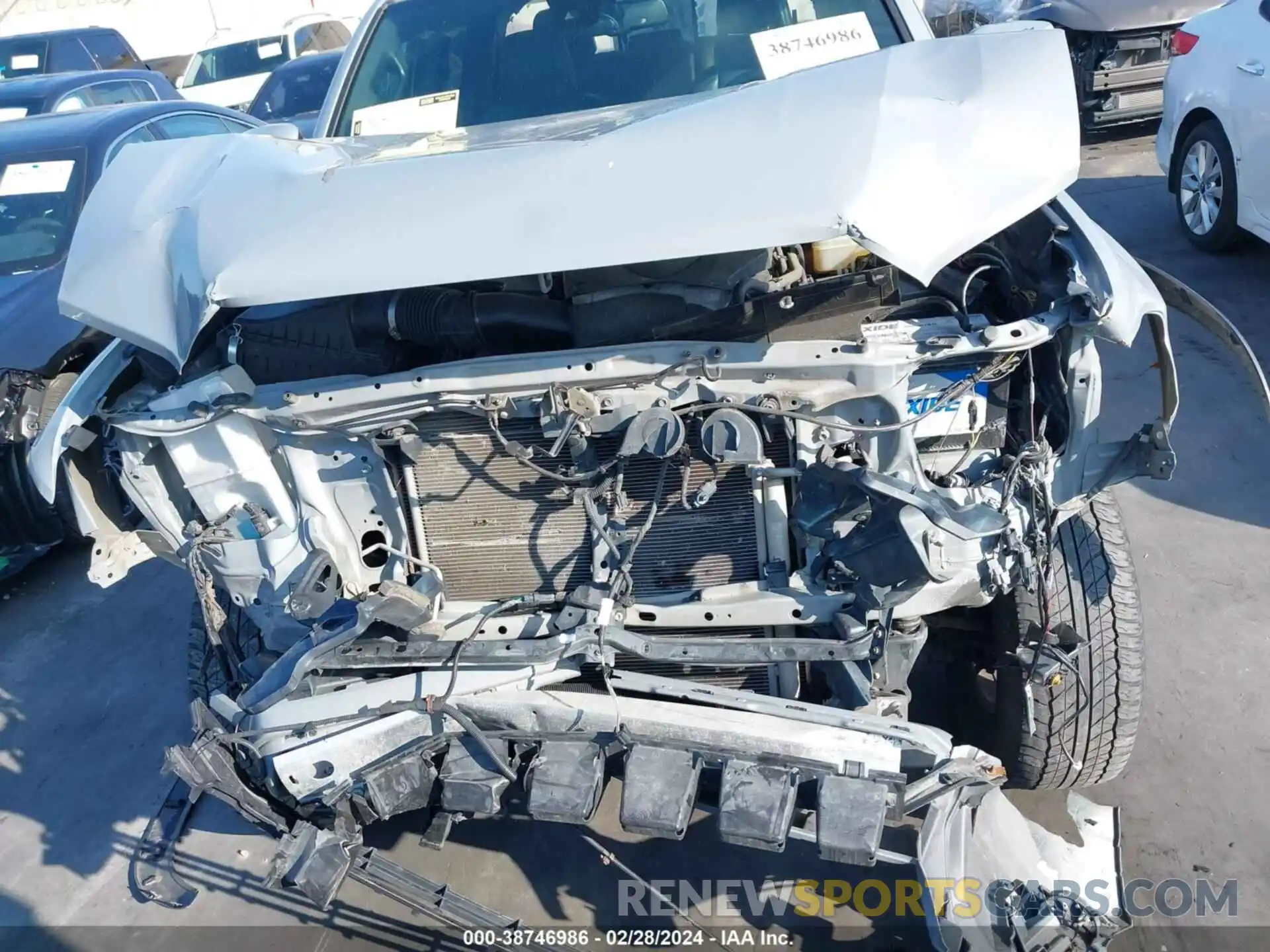 13 Photograph of a damaged car 5TFCZ5AN9KX200606 TOYOTA TACOMA 2019