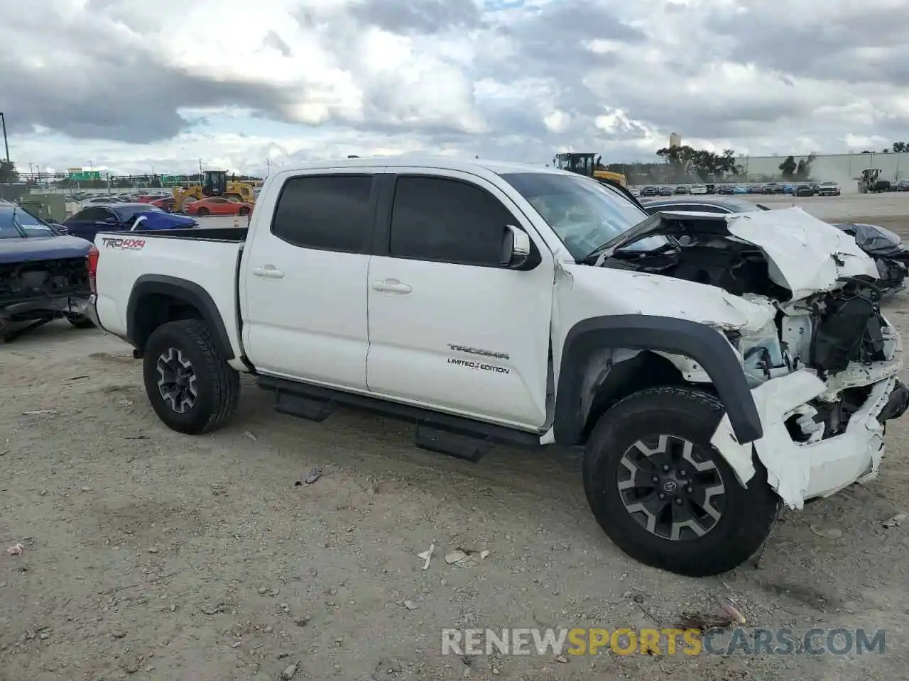 4 Photograph of a damaged car 5TFCZ5ANXKX165896 TOYOTA TACOMA 2019