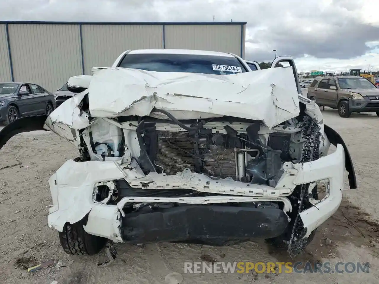 5 Photograph of a damaged car 5TFCZ5ANXKX165896 TOYOTA TACOMA 2019