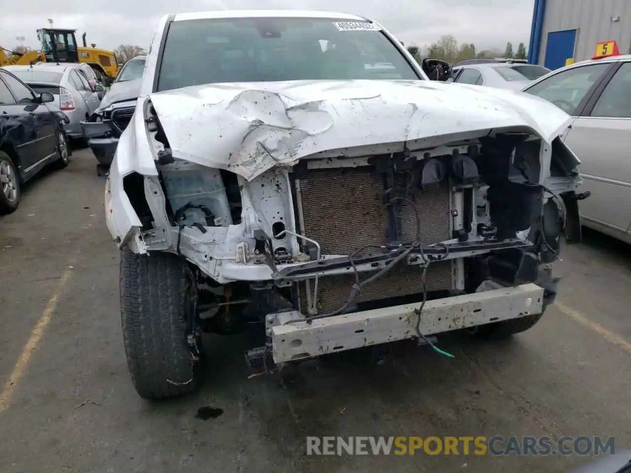 9 Photograph of a damaged car 5TFCZ5ANXKX207015 TOYOTA TACOMA 2019