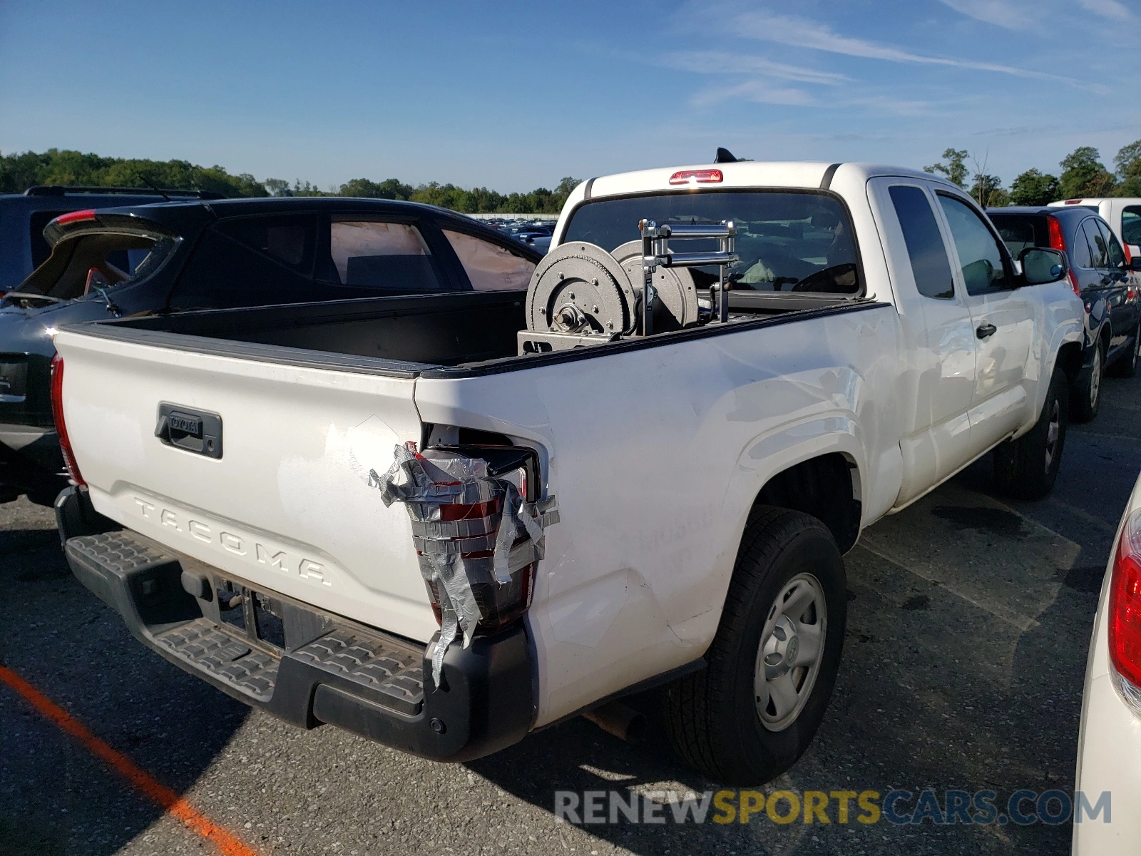 4 Photograph of a damaged car 5TFRX5GN1KX148041 TOYOTA TACOMA 2019