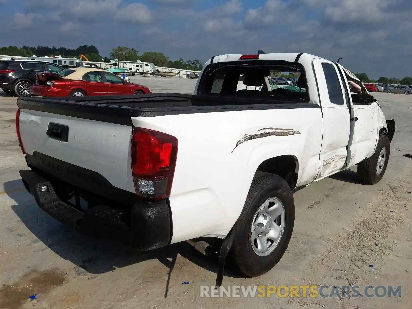 4 Photograph of a damaged car 5TFRX5GN3KX154133 TOYOTA TACOMA 2019