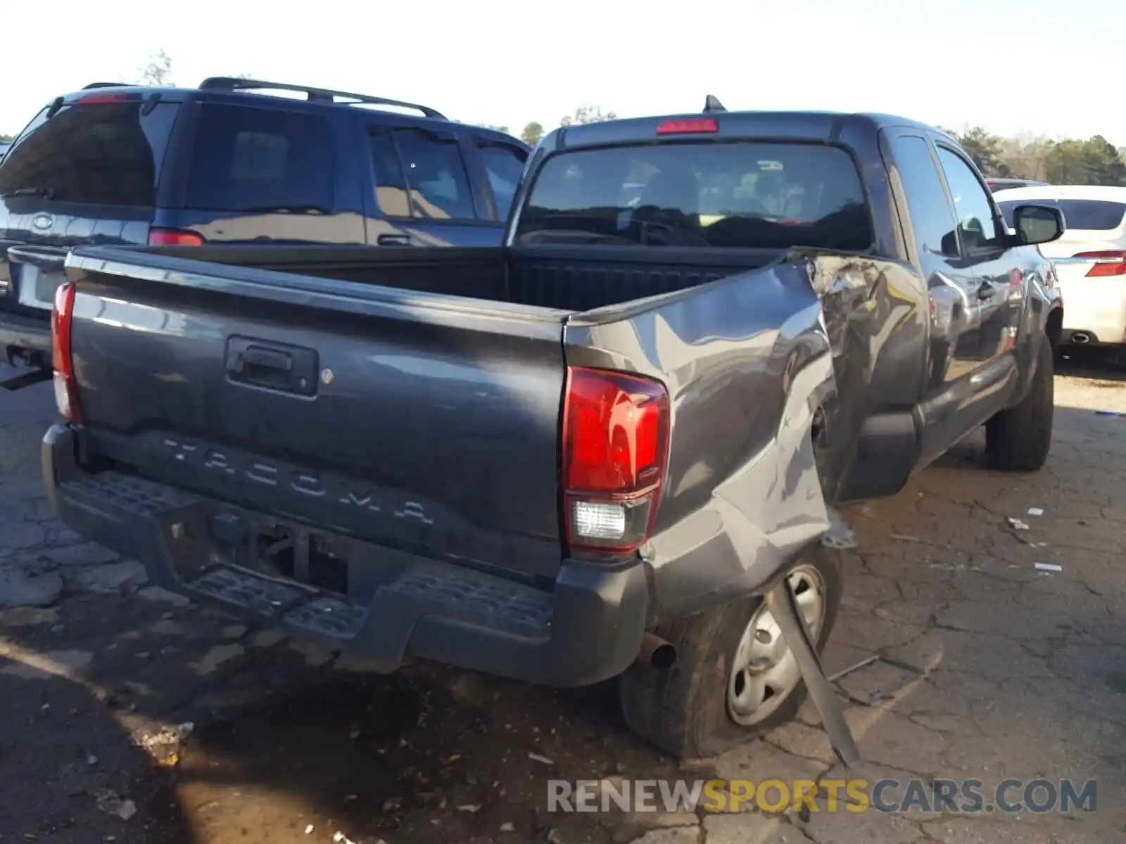 4 Photograph of a damaged car 5TFRX5GN4KX136837 TOYOTA TACOMA 2019