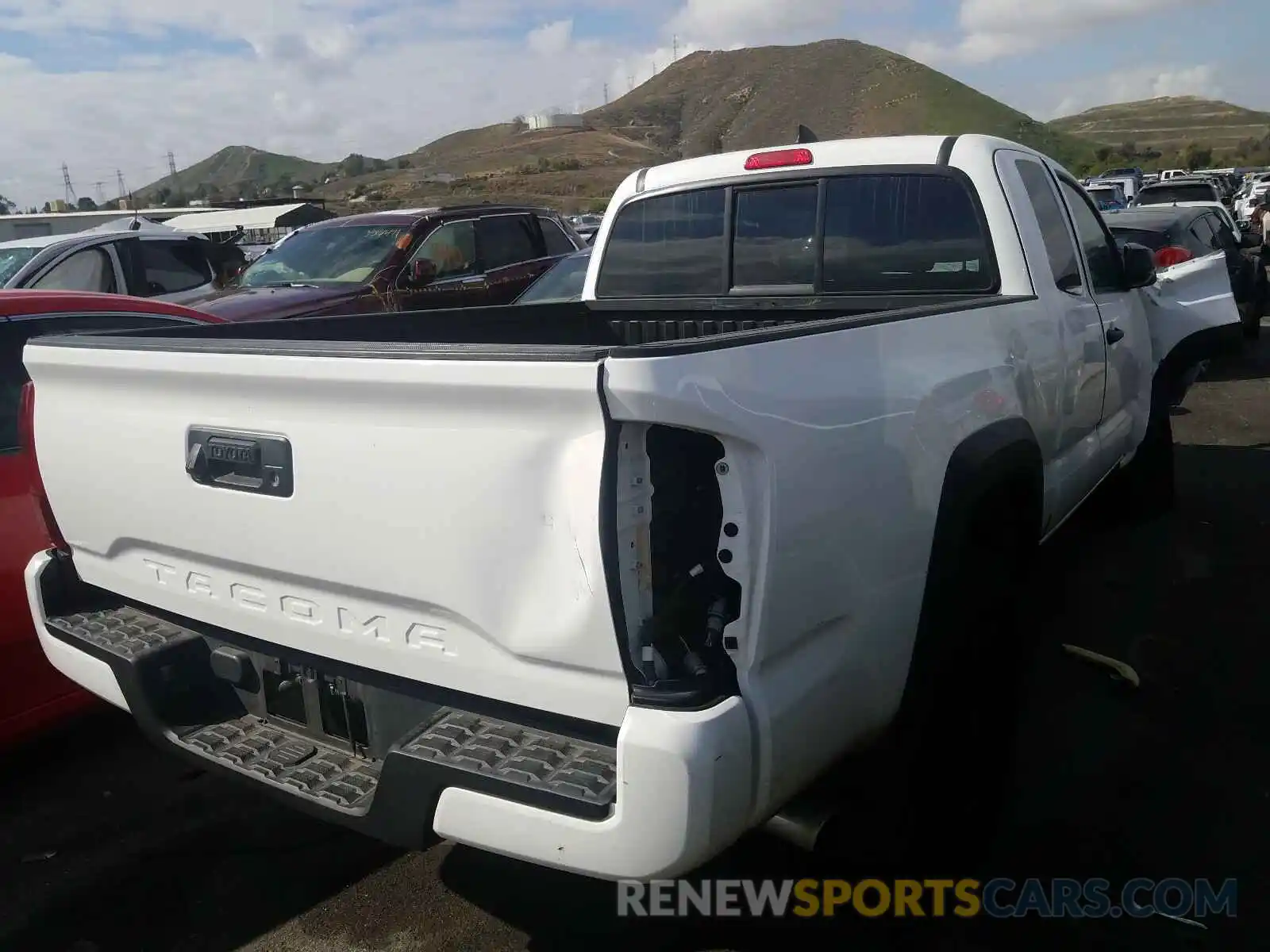 4 Photograph of a damaged car 5TFRX5GN5KX159947 TOYOTA TACOMA 2019