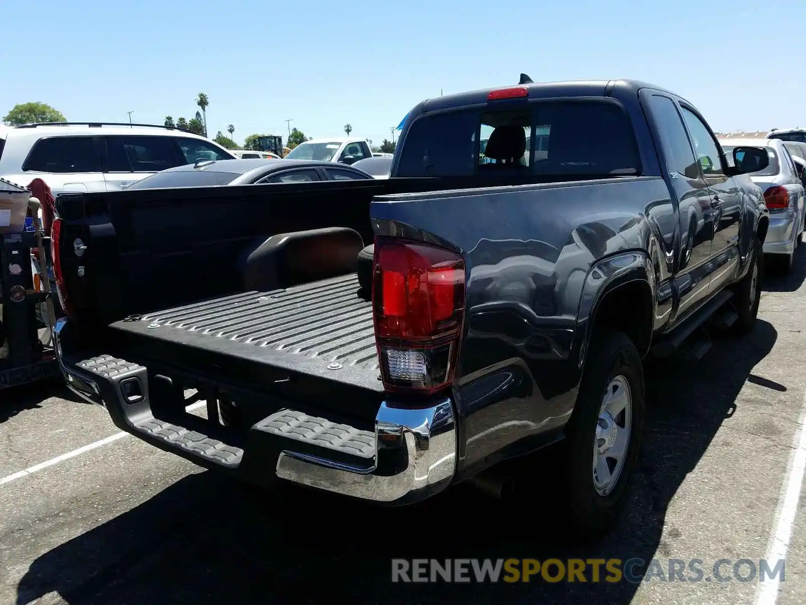 4 Photograph of a damaged car 5TFRX5GN6KX159407 TOYOTA TACOMA 2019