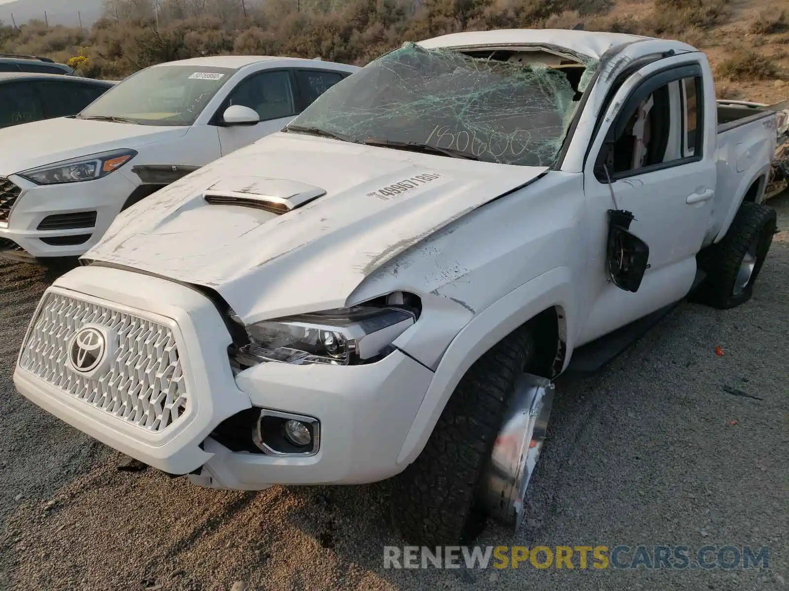 2 Photograph of a damaged car 5TFSZ5AN0KX180600 TOYOTA TACOMA 2019