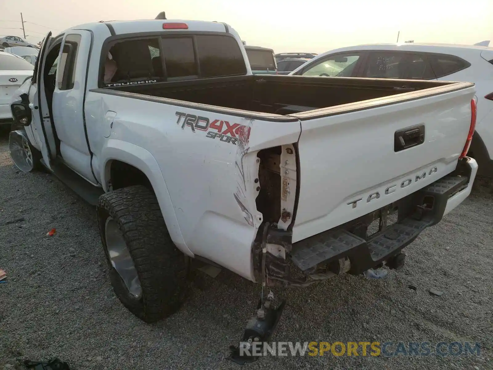 3 Photograph of a damaged car 5TFSZ5AN0KX180600 TOYOTA TACOMA 2019