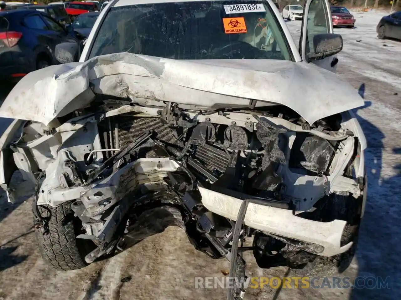 7 Photograph of a damaged car 5TFSZ5AN1KX173168 TOYOTA TACOMA 2019