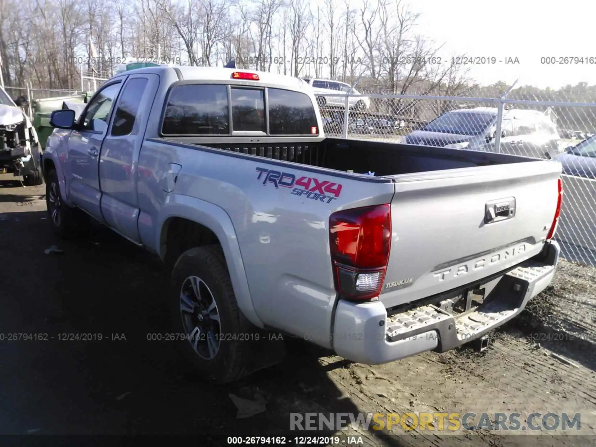 3 Photograph of a damaged car 5TFSZ5AN2KX174684 TOYOTA TACOMA 2019