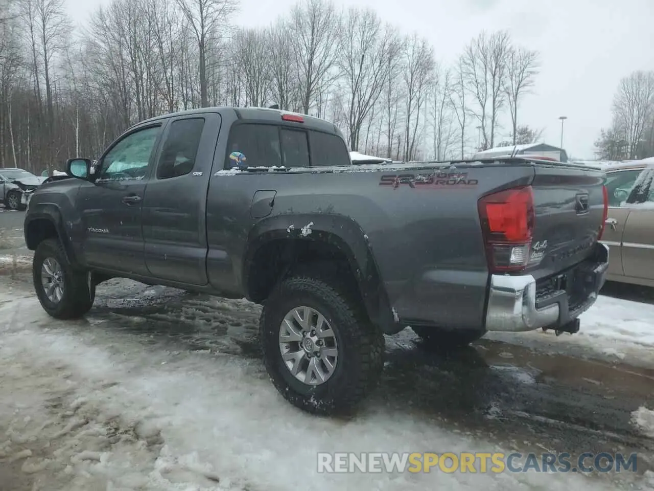 2 Photograph of a damaged car 5TFSZ5AN2KX182865 TOYOTA TACOMA 2019