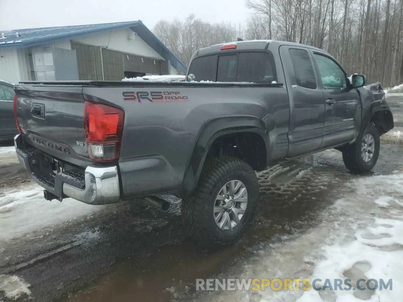 3 Photograph of a damaged car 5TFSZ5AN2KX182865 TOYOTA TACOMA 2019