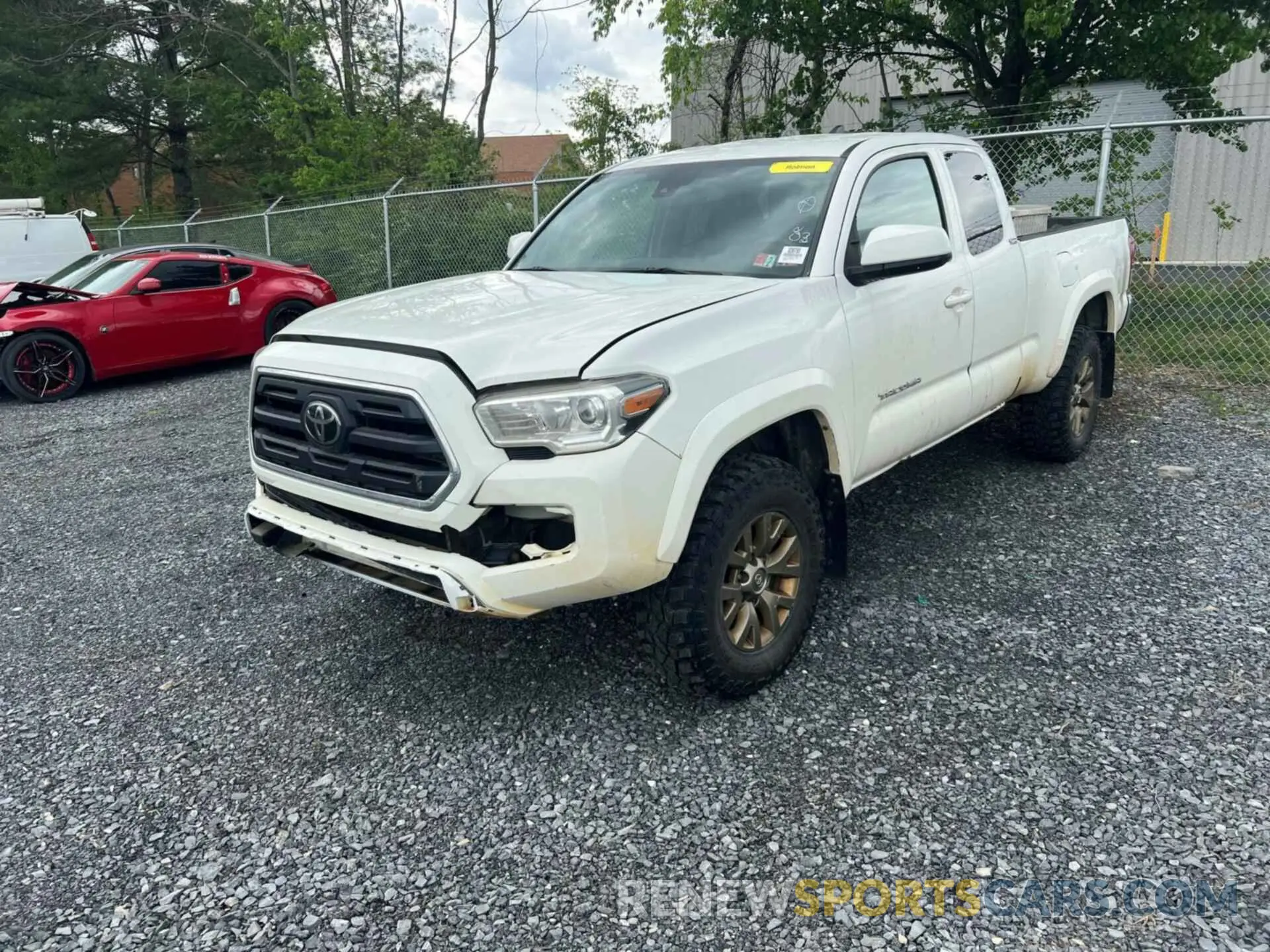 32 Photograph of a damaged car 5TFSZ5AN2KX194692 TOYOTA TACOMA 2019