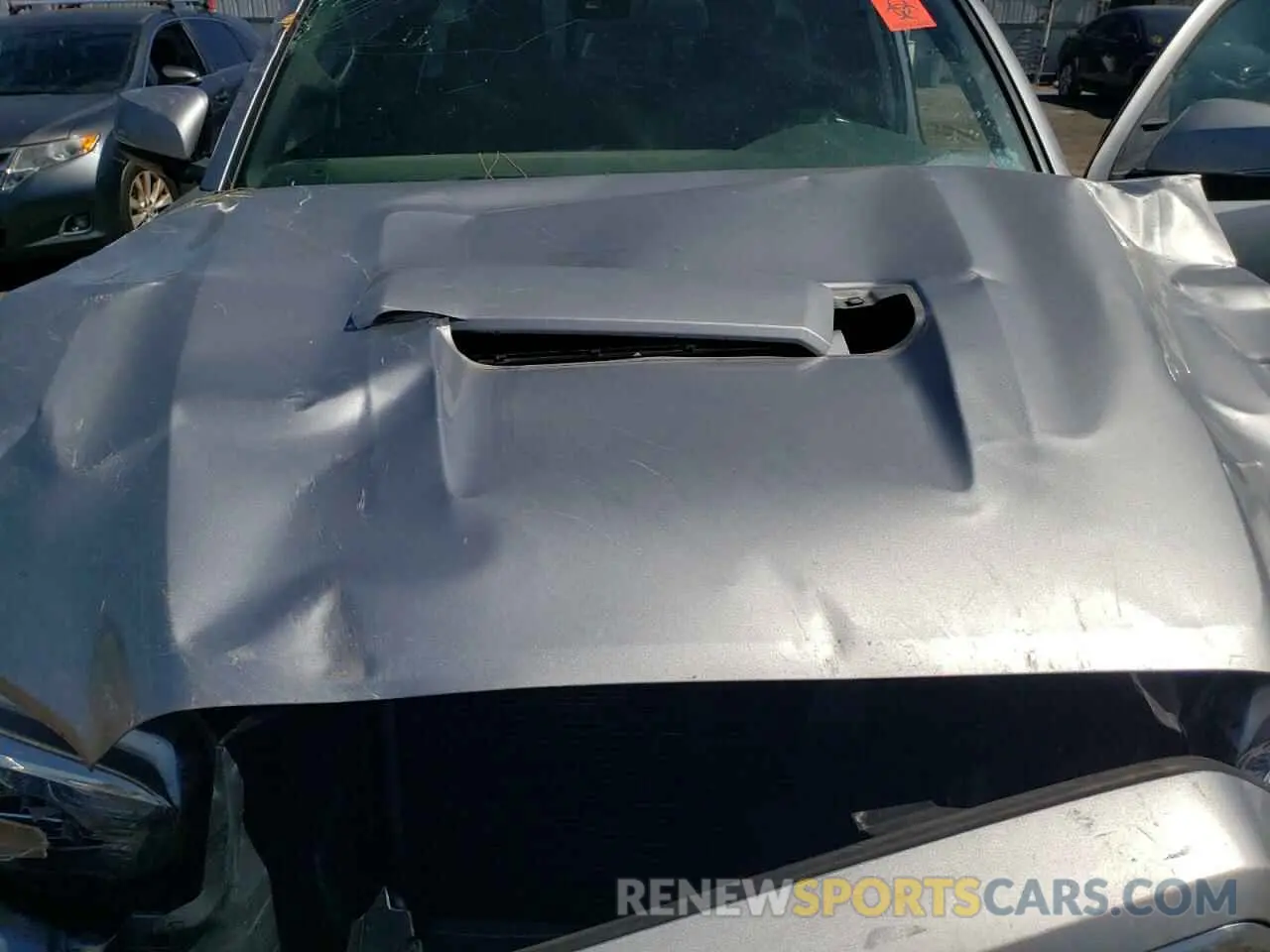 11 Photograph of a damaged car 5TFSZ5AN3KX205733 TOYOTA TACOMA 2019