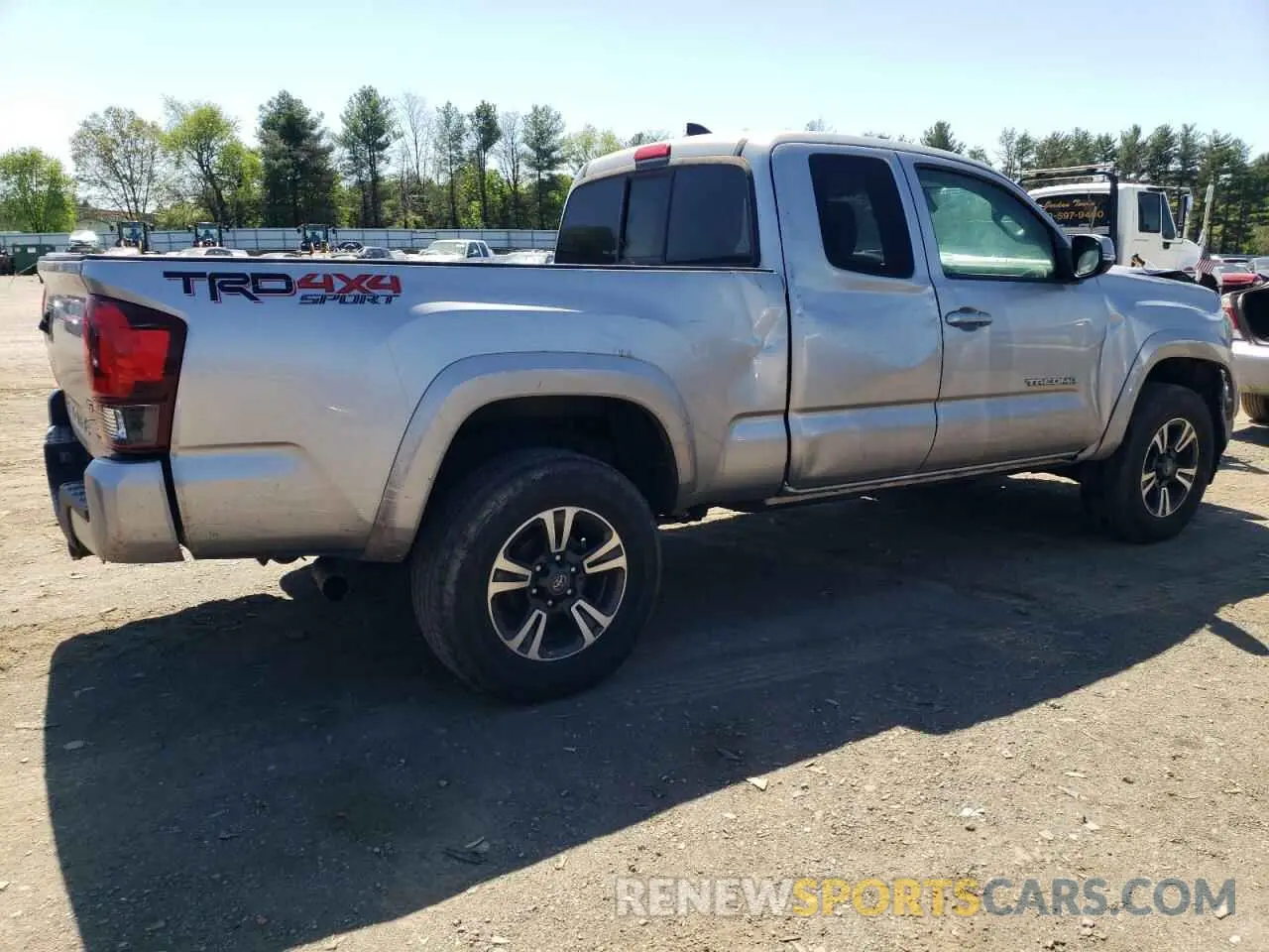 3 Photograph of a damaged car 5TFSZ5AN3KX205733 TOYOTA TACOMA 2019