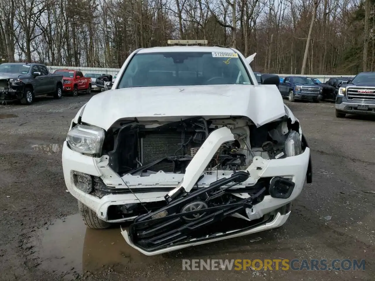 5 Photograph of a damaged car 5TFSZ5AN5KX198803 TOYOTA TACOMA 2019