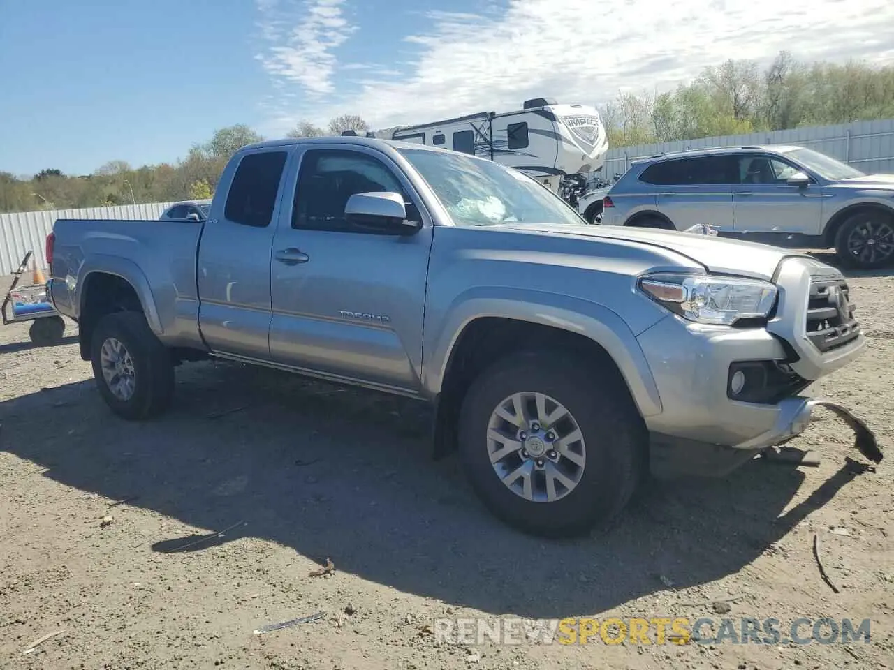 4 Photograph of a damaged car 5TFSZ5AN5KX202901 TOYOTA TACOMA 2019