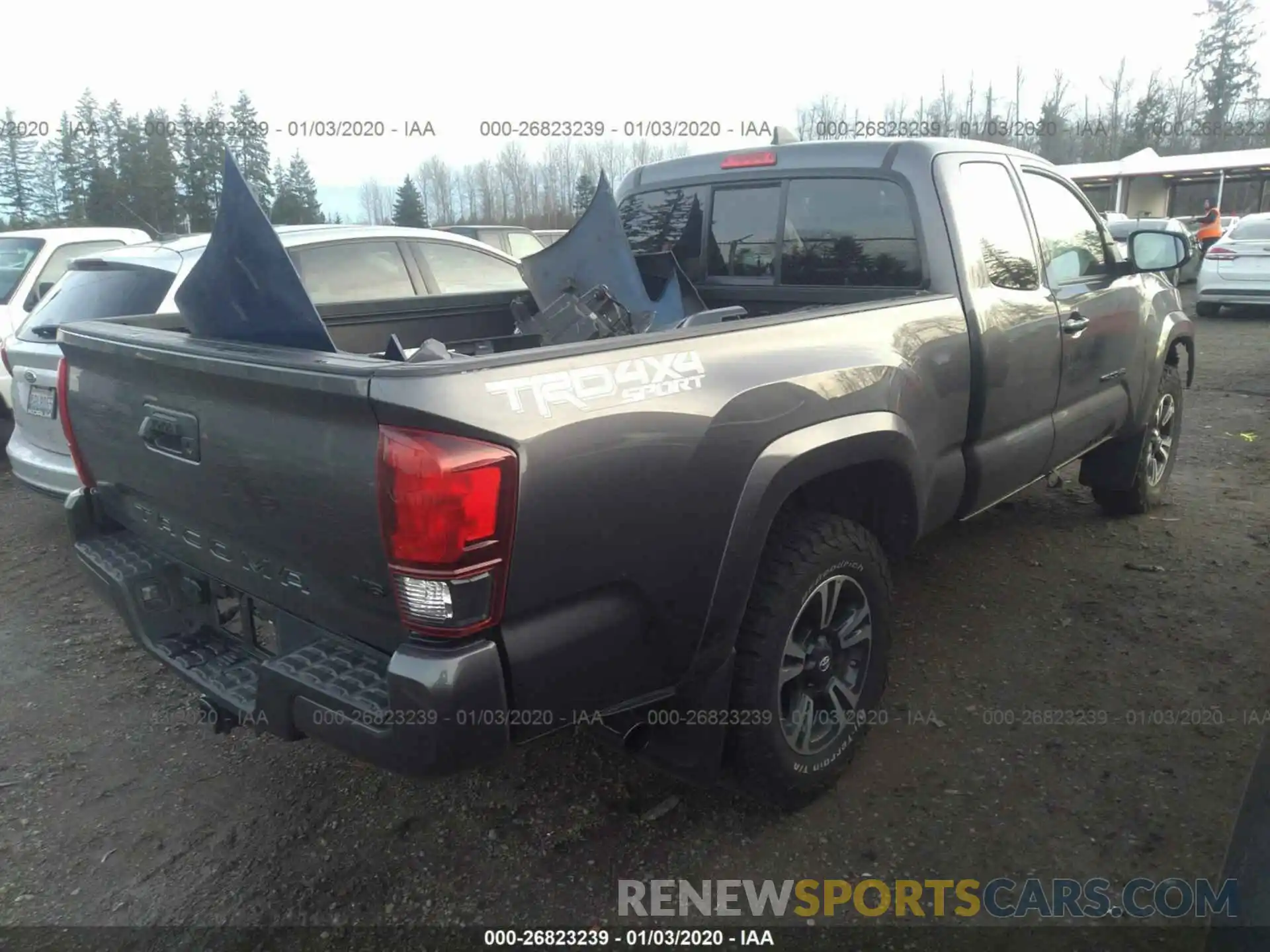 4 Photograph of a damaged car 5TFSZ5AN6KX193142 TOYOTA TACOMA 2019