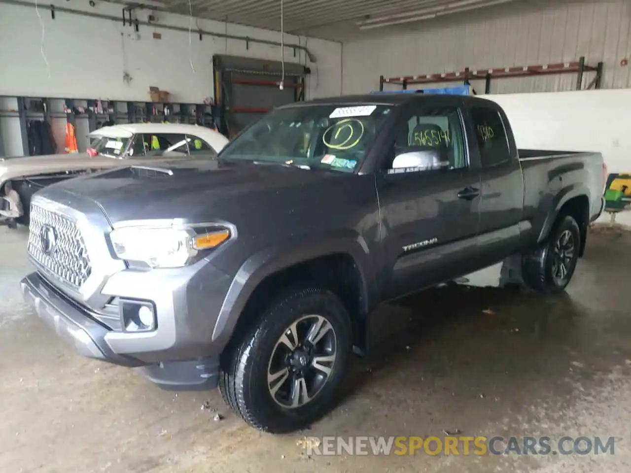 2 Photograph of a damaged car 5TFSZ5AN7KX203855 TOYOTA TACOMA 2019