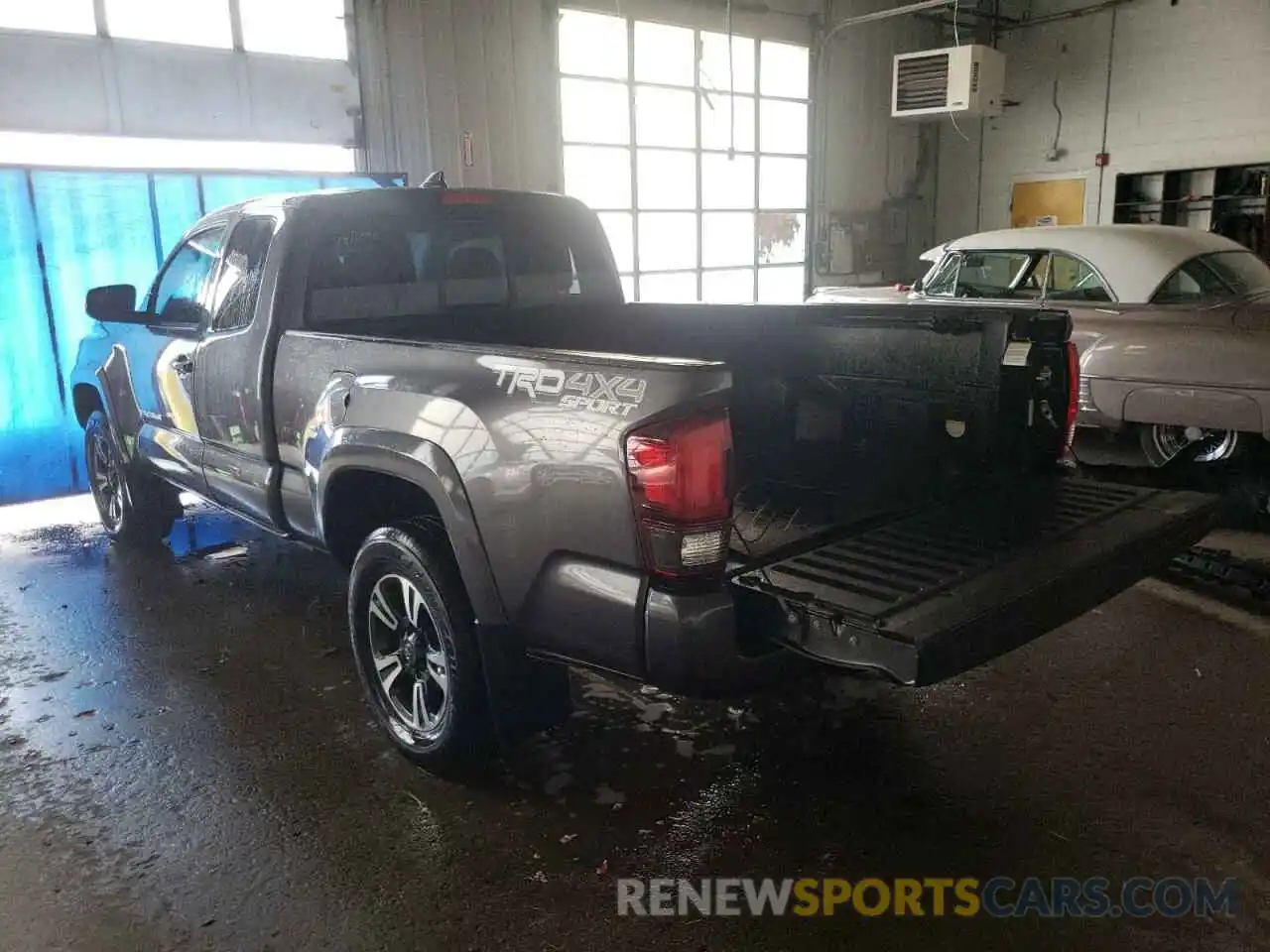 3 Photograph of a damaged car 5TFSZ5AN7KX203855 TOYOTA TACOMA 2019