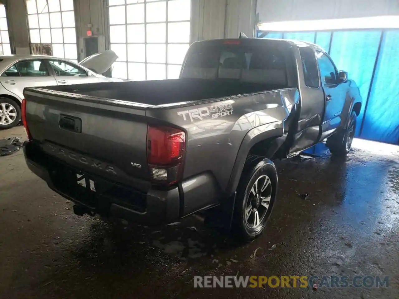 4 Photograph of a damaged car 5TFSZ5AN7KX203855 TOYOTA TACOMA 2019