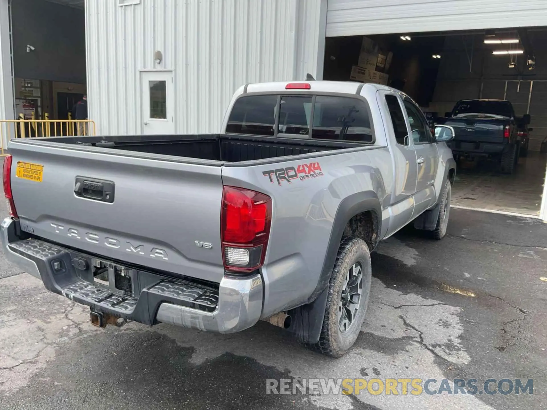 4 Photograph of a damaged car 5TFSZ5AN7KX210918 TOYOTA TACOMA 2019